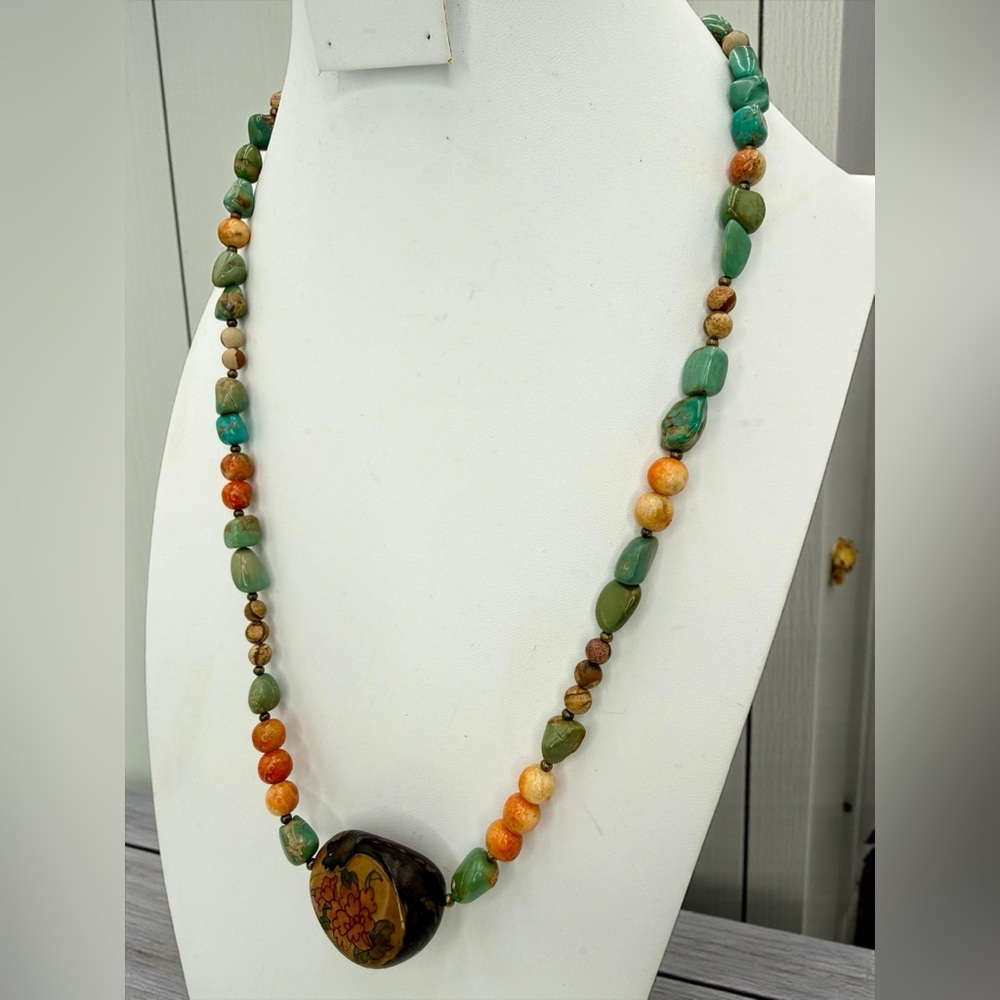 Green and Orange Beaded Necklace with Floral Pendant